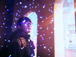 Light projected on a man's face
