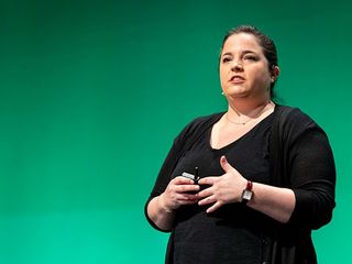 Michelle Beeson speaking on a stage