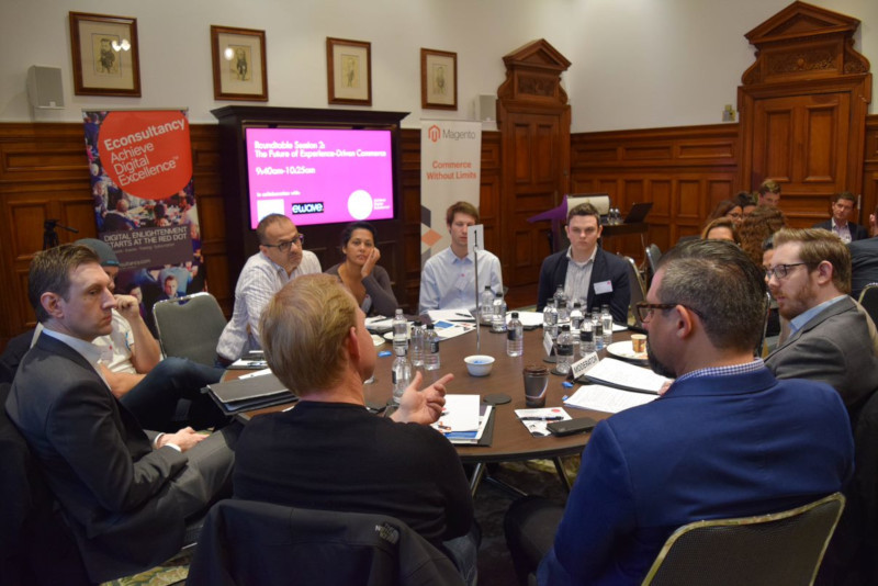 Group of people sitting around a table at Econsultancy meeting