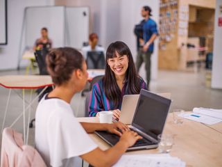 Women working with technology 